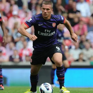 Podolski in Action: Arsenal vs. Stoke City, Premier League 2012-13 Podolski in Action: Arsenal vs. Stoke City, Premier League 2012-13