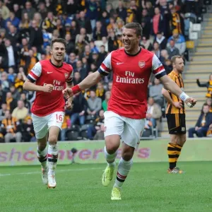 Podolski and Ramsey Celebrate Arsenal's Winning Goals vs Hull City (2014) Podolski and Ramsey Celebrate Arsenal's Winning Goals vs Hull City (2014)