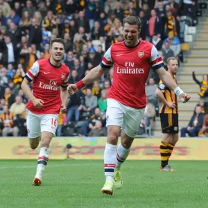 Podolski and Ramsey's Unforgettable Moment: Arsenal's Winning Goals Against Hull City (2014)
