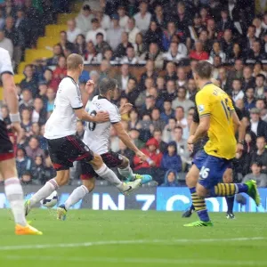 Podolski Scores the Third: Fulham vs. Arsenal, Premier League 2013-14 Podolski Scores the Third: Fulham vs. Arsenal, Premier League 2013-14