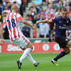 Podolski vs. Wilkinson: Battle at Britannia Stadium - Stoke City vs. Arsenal, 2012-13 Premier League