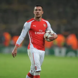 Podolski's Emotional Reaction: Arsenal FC vs Borussia Dortmund, UEFA Champions League (2014-15)
