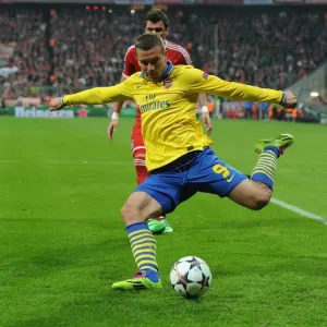 Podolski's Return: A Bayern Munich Legend Haunts Old Team in Champions League Showdown - Arsenal vs. FC Bayern Munich, 2014 Podolski's Return: A Bayern Munich Legend Haunts Old Team in Champions League Showdown - Arsenal vs. FC Bayern Munich, 2014