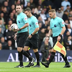 Premier League: Leeds United vs. Arsenal - Referees Prepare for Kick-off (October 2022)