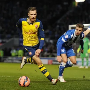 Print of Aaron Ramsey Breaking Past Brighton's Defense