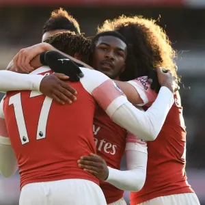 Print of Alex Iwobi and Ainsley Maitland-Niles Celebrating a Goal Print of Alex Iwobi and Ainsley Maitland-Niles Celebrating a Goal