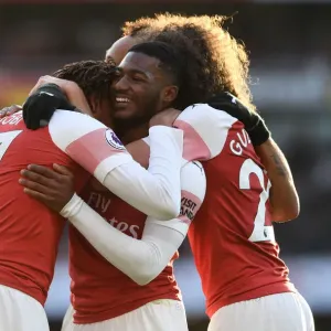 Print of Alex Iwobi and Ainsley Maitland-Niles Celebrating Victory Print of Alex Iwobi and Ainsley Maitland-Niles Celebrating Victory
