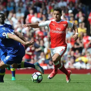 Print of Alexis Sanchez vs Phil Jagielka in action Print of Alexis Sanchez vs Phil Jagielka in action