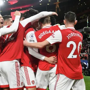Print of Arsenal Players Celebrating a Goal