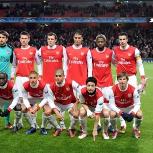 Print of The Arsenal team in action during a UEFA Champions League match Print of The Arsenal team in action during a UEFA Champions League match
