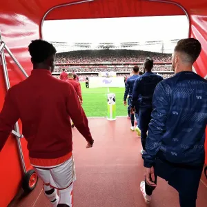 Print of Bukayo Saka and James Maddison at Emirates Stadium