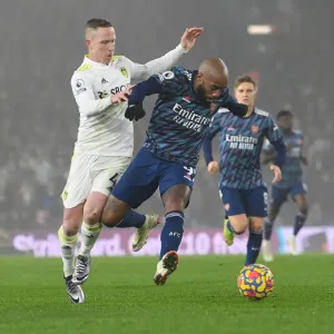 Print of Lacazette vs Forshaw in action