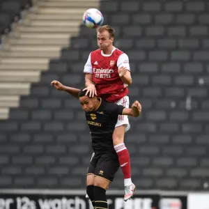 Print of Rob Holding in Arsenal Pre-Season Action