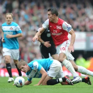 Print of Robin van Persie passing Michael Turner
