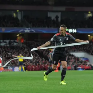 Rafina (Bayern) clears paper from the pitch thrown on by the Bayern fans. Arsenal 1 Rafina (Bayern) clears paper from the pitch thrown on by the Bayern fans. Arsenal 1