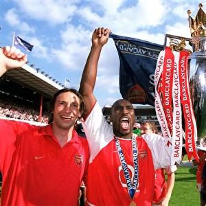 Rami Shaaban, Sol Campbell and Ashley Cole with the Premiership Trophy