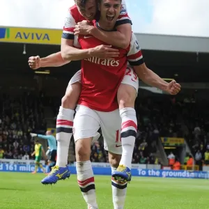 Ramsey and Jenkinson Celebrate Arsenal's Goal Against Norwich City (2013-14)