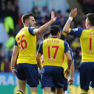 Ramsey and Ozil in Unison: Celebrating a Goal for Arsenal against Burnley, 2014/15 Ramsey and Ozil in Unison: Celebrating a Goal for Arsenal against Burnley, 2014/15