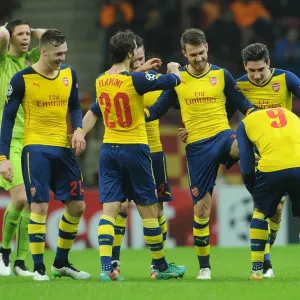 Ramsey and Podolski Celebrate Arsenal's Champions League Goals Against Galatasaray Ramsey and Podolski Celebrate Arsenal's Champions League Goals Against Galatasaray
