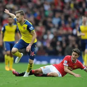 Ramsey Surges Past Herrera: Manchester United vs. Arsenal, Premier League Clash (2014-15) Ramsey Surges Past Herrera: Manchester United vs. Arsenal, Premier League Clash (2014-15)