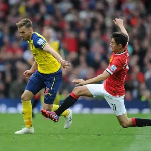 Ramsey Surges Past Herrera: A Premier League Showdown (2014-15) - Manchester United vs. Arsenal Ramsey Surges Past Herrera: A Premier League Showdown (2014-15) - Manchester United vs. Arsenal