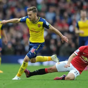 Ramsey Surges Past Herrera: A Premier League Showdown (2014-15) - Manchester United vs. Arsenal Ramsey Surges Past Herrera: A Premier League Showdown (2014-15) - Manchester United vs. Arsenal