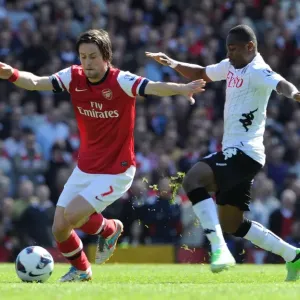 Ramsey vs. Enoh: Intense Battle in Fulham vs. Arsenal Premier League Clash (Tomas Rosicky in Action) Ramsey vs. Enoh: Intense Battle in Fulham vs. Arsenal Premier League Clash (Tomas Rosicky in Action)