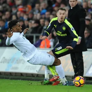 Ramsey vs. Fer: Intense Battle in Swansea City vs. Arsenal Premier League Clash Ramsey vs. Fer: Intense Battle in Swansea City vs. Arsenal Premier League Clash