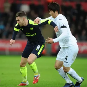 Ramsey vs. Ki: Intense Battle in Swansea City vs. Arsenal Premier League Clash Ramsey vs. Ki: Intense Battle in Swansea City vs. Arsenal Premier League Clash
