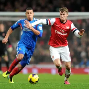Ramsey vs. Livermore: A Battle of Intense Determination in Arsenal's Clash Against Hull (2013-14)