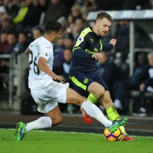 Ramsey vs Naughton: Intense Battle in Swansea City vs Arsenal Premier League Clash Ramsey vs Naughton: Intense Battle in Swansea City vs Arsenal Premier League Clash