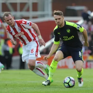Ramsey vs. Whelan: Intense Battle in Stoke City vs. Arsenal Premier League Clash