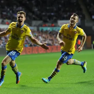 Ramsey and Wilshere Celebrate Arsenal's Victory: Swansea v Arsenal, 2013-14 Premier League Ramsey and Wilshere Celebrate Arsenal's Victory: Swansea v Arsenal, 2013-14 Premier League