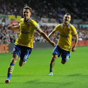 Ramsey and Wilshere: Celebrating Arsenal's Victory at Swansea (2013-14) Ramsey and Wilshere: Celebrating Arsenal's Victory at Swansea (2013-14)