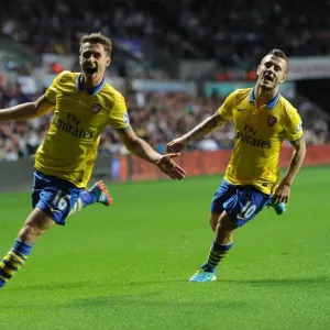 Ramsey and Wilshere: Celebrating Arsenal's Winning Goals Against Swansea (2013-14) Ramsey and Wilshere: Celebrating Arsenal's Winning Goals Against Swansea (2013-14)