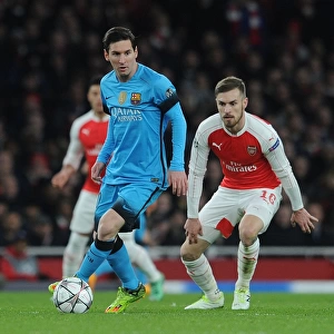 Ramsey's Chase: Arsenal's Midfielder Closes In on Messi in Arsenal vs. Barcelona Champions League Clash