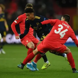 Reiss Nelson Darts Past Kostas Laifis: Arsenal's Europa League Battle at Standard Liege Reiss Nelson Darts Past Kostas Laifis: Arsenal's Europa League Battle at Standard Liege