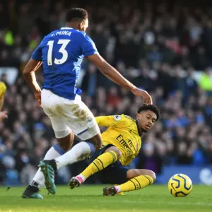 Reiss Nelson vs Yerry Mina: Intense Battle at Goodison Park - Everton vs Arsenal, Premier League 2019-20 Reiss Nelson vs Yerry Mina: Intense Battle at Goodison Park - Everton vs Arsenal, Premier League 2019-20