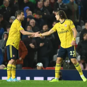 Rivals Unite: Sokratis and Luiz Share a Moment after United vs. Arsenal (2019-20)
