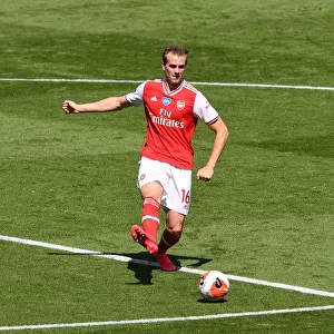 Rob Holding in Action: Arsenal's Defensive Battle against Brighton & Hove Albion, Premier League 2019-2020