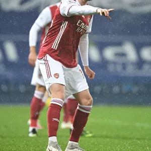 Rob Holding in Action: Arsenal's Defensive Showdown at West Bromwich Albion, Premier League 2020-21