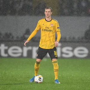 Rob Holding in Action: Arsenal's Europa League Battle against Vitoria Guimaraes Rob Holding in Action: Arsenal's Europa League Battle against Vitoria Guimaraes