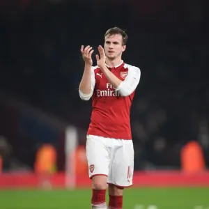 Rob Holding Celebrates with Arsenal Fans: Carabao Cup Quarterfinal Victory over West Ham Rob Holding Celebrates with Arsenal Fans: Carabao Cup Quarterfinal Victory over West Ham