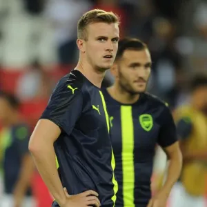 Rob Holding's Steely Gaze: Arsenal's Defender Prepares for Paris Saint-Germain Champions League Showdown