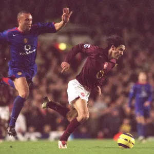 Robert Pires (Arsenal) Mikael Silvestre (Man Utd) Robert Pires (Arsenal) Mikael Silvestre (Man Utd)