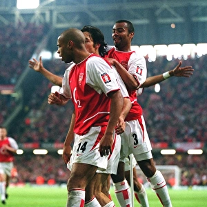 Robert Pires celebrates scoring the Arsenal goal with Thierry Henry and Ashley Cole