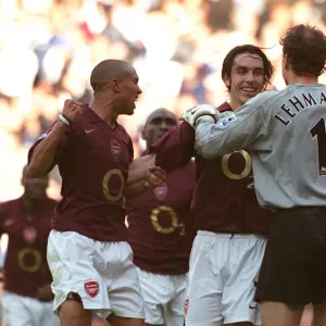 Robert Pires celebrates scoring the Arsenal goal with Gael Clichy and Jens Lehmann Robert Pires celebrates scoring the Arsenal goal with Gael Clichy and Jens Lehmann