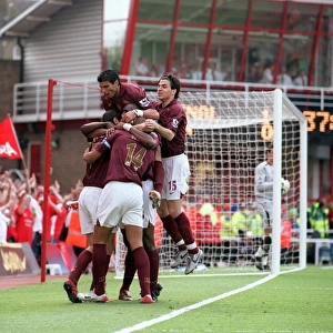 Robert Pires celebrates scoring Arsenals 1st goal with Jose Reyes and Cesc Fabregas