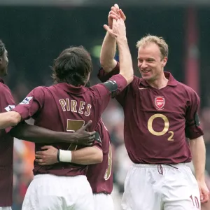 Robert Pires celebrates scoring Arsenals 2nd goal with Dennis Bergkamp