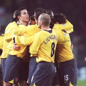 Robert Pires celebrates scoring Arsenals goal from the penalty spot with Robin van Persie Robert Pires celebrates scoring Arsenals goal from the penalty spot with Robin van Persie